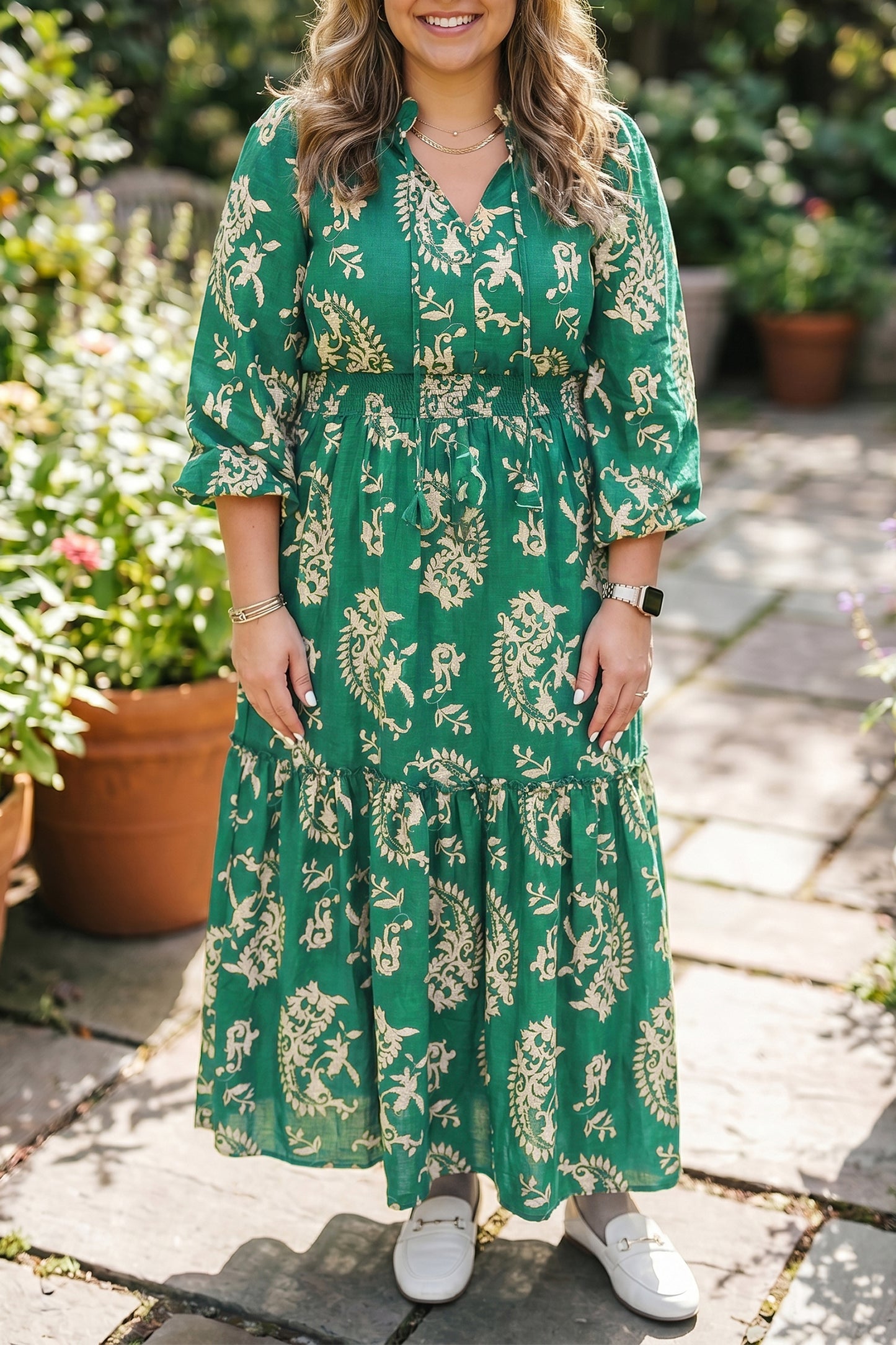 Plus size groene jurk met bloemenprint en V-hals