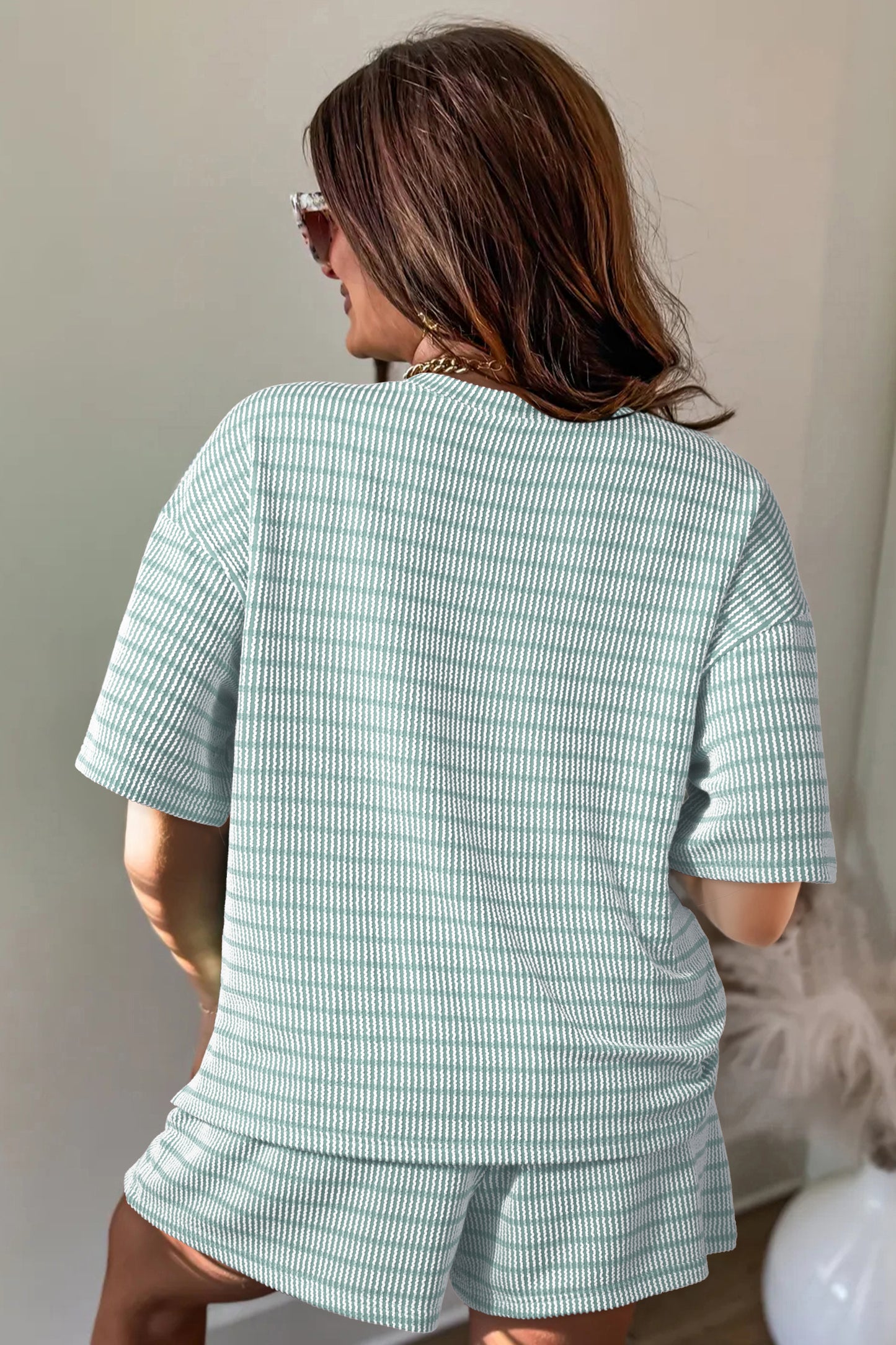 T-shirt met opstaande ribbels los model en shorts met trekkoord in de taille 2-delige set