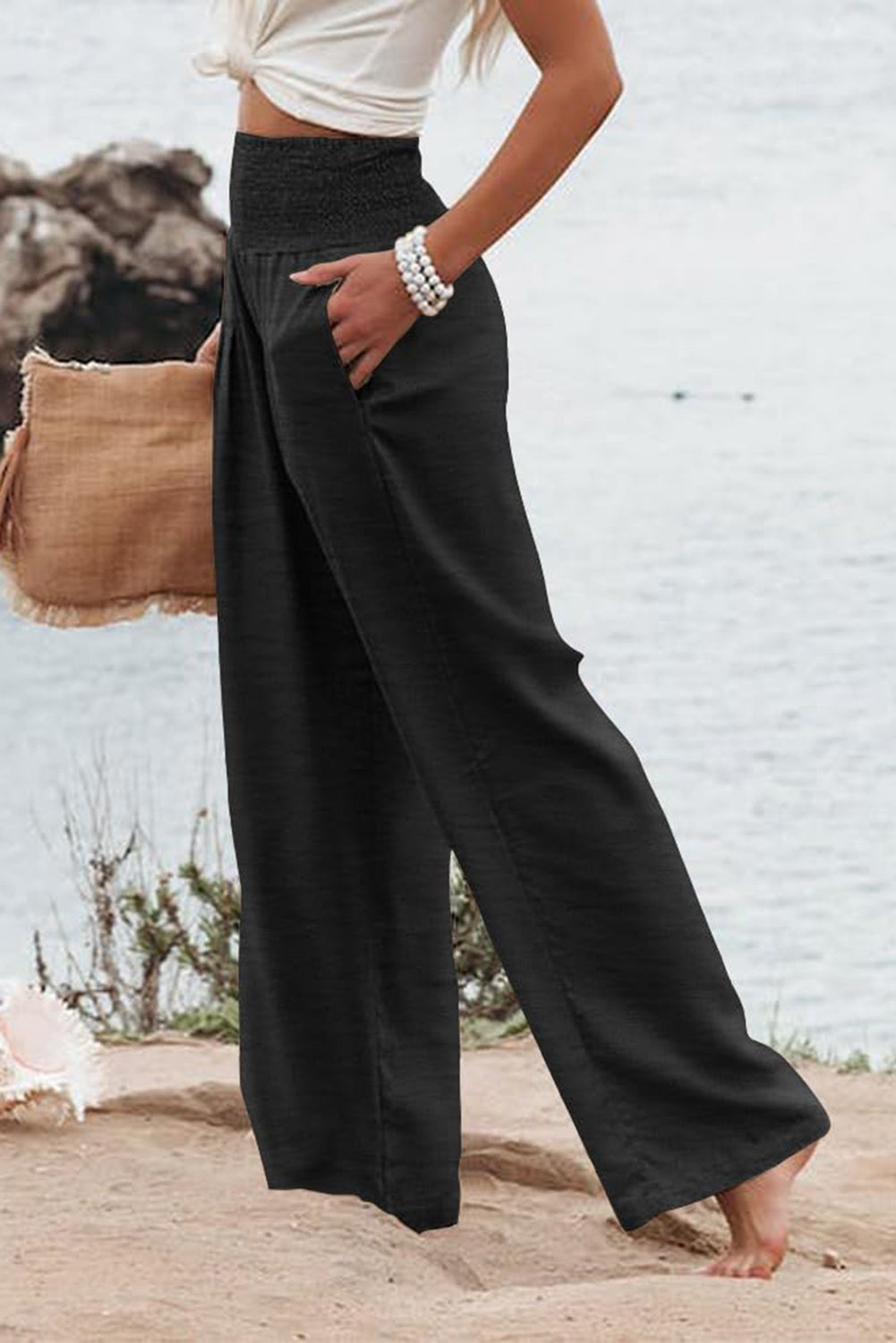 Zwarte geplooide broek met hoge taille en wijde pijpen plus size