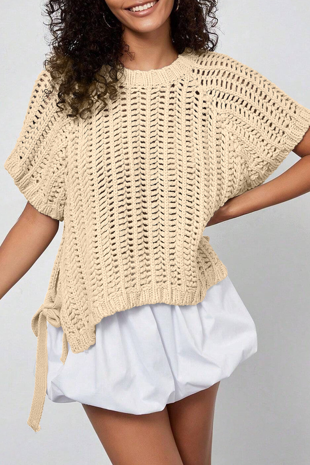 Plus size open gebreide trui met strik en korte mouwen