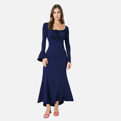 Elegante damesjurk met lange trompetmouwen en fishtail rok