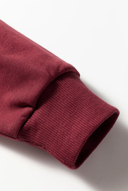 Preppy sweatshirt met strepen op de mouwen en een losse pasvorm
