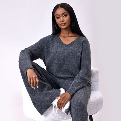 Gebreid geborsteld pak met lange mouwen en verzonken strepen