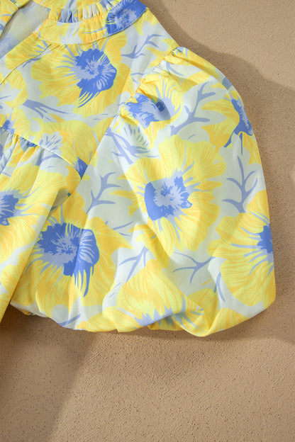 Zomerblouse met korte pofmouwen en bloemenprint