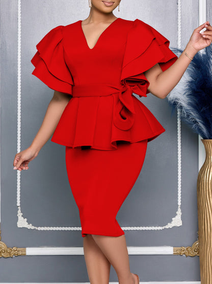 Elegant dress with lotus-leaf trim and solid color