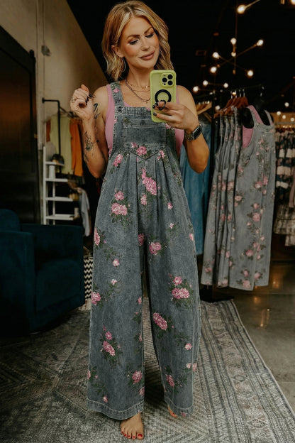 Jumpsuit van denim met bloemenprint zakken geplooide details hoge taille en wijde pijpen