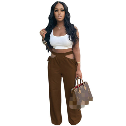 Effen kleur cut out taille wijde uitlopende broek