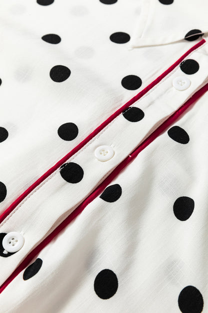 Elegante overhemd met witte stippenprint en contrasterende bies