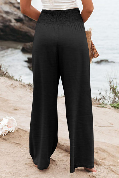 Zwarte geplooide broek met hoge taille en wijde pijpen plus size