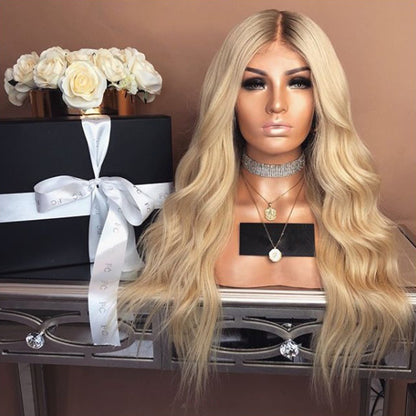 Synthetisch lange lichtgouden golvend lace wig