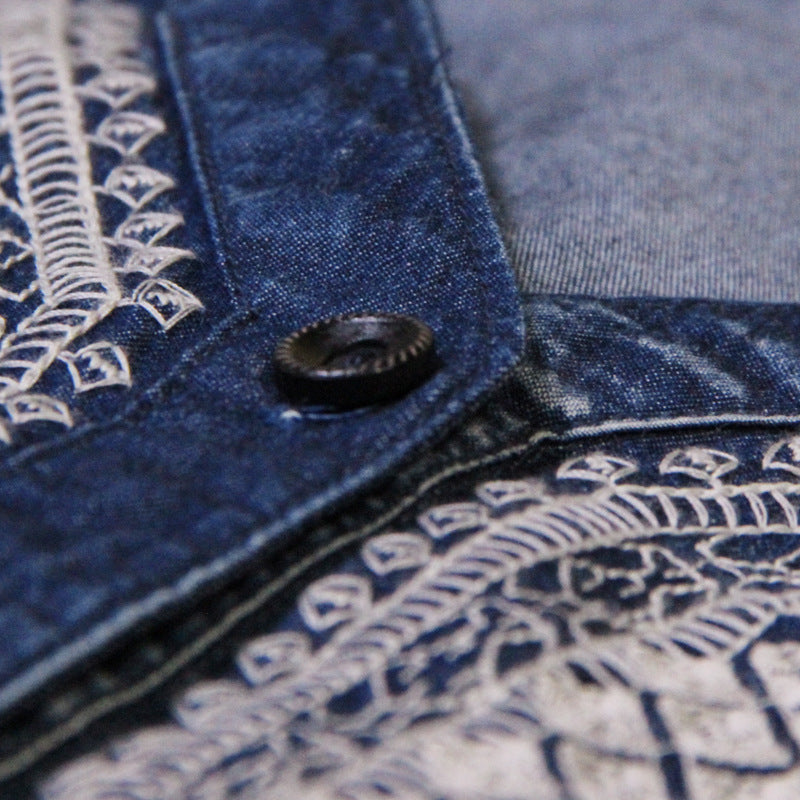 Geborduurde denim jurk