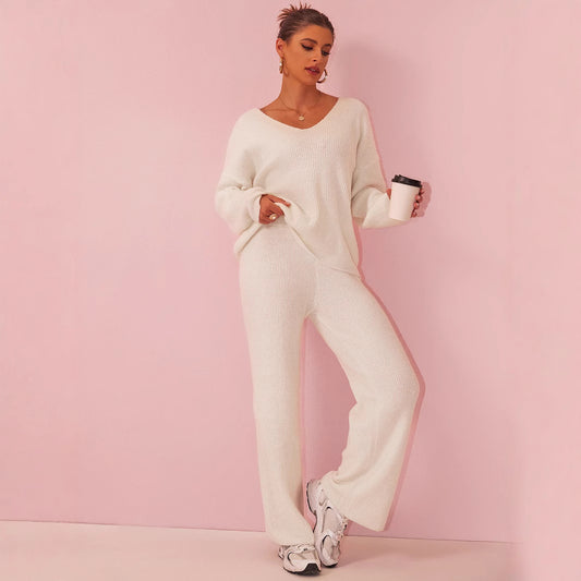 Gebreid geborsteld pak met lange mouwen en verzonken strepen