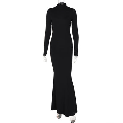 Elegante effen feestjurk uit één stuk met lange mouwen hoge hals en open rug