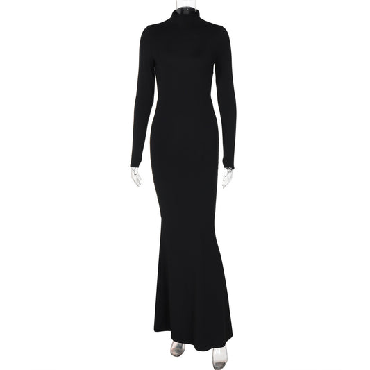 Elegante effen feestjurk uit één stuk met lange mouwen hoge hals en open rug