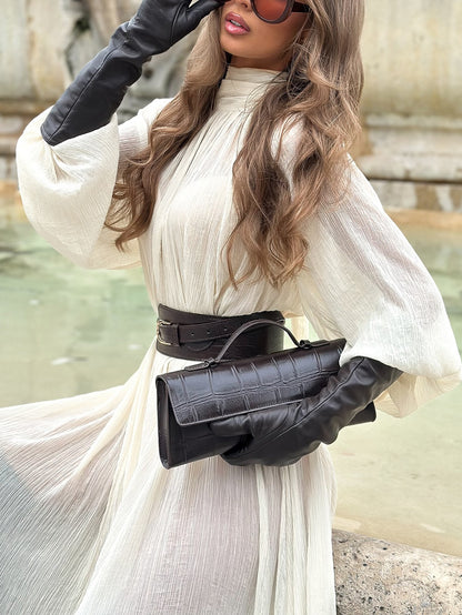 Witte maxi-jurk met lange mouwen volant en hoge strikhals