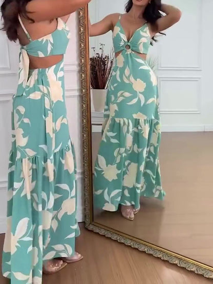 Mouwloze jurk met resortprint en uitsparingen