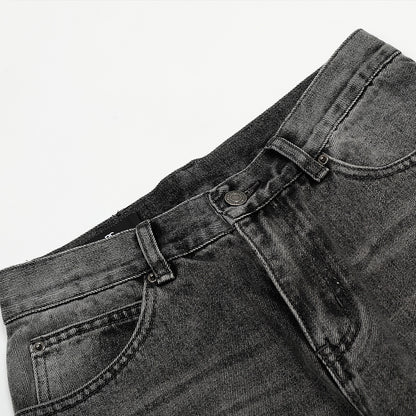 Washed and ground white distressed jeans
