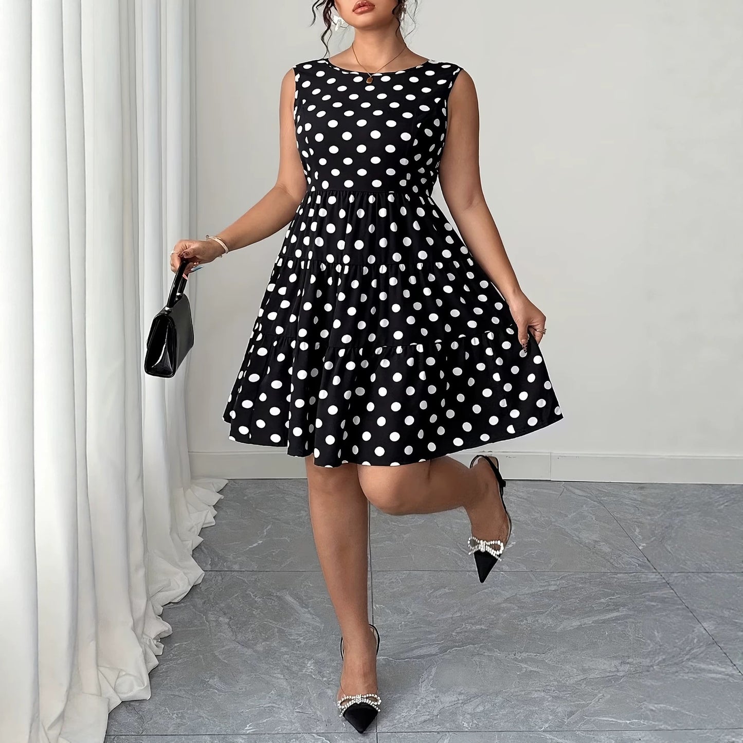 Plus size retro mouwloze jurkje  met parels stippenprint en strik