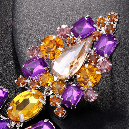 Holle kristallen oorbellen met opvallende hangers