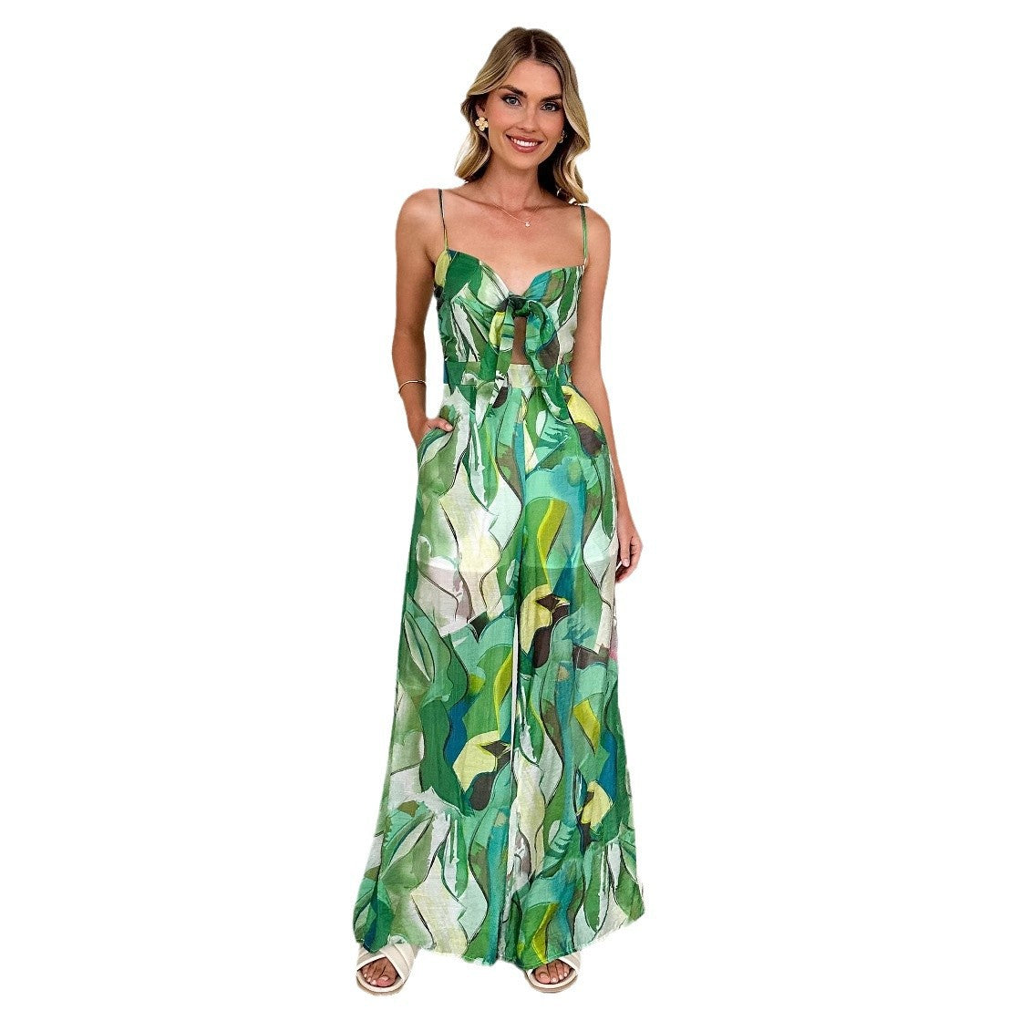 Casual bedrukte jumpsuit met jarretelbandjes en strikjes