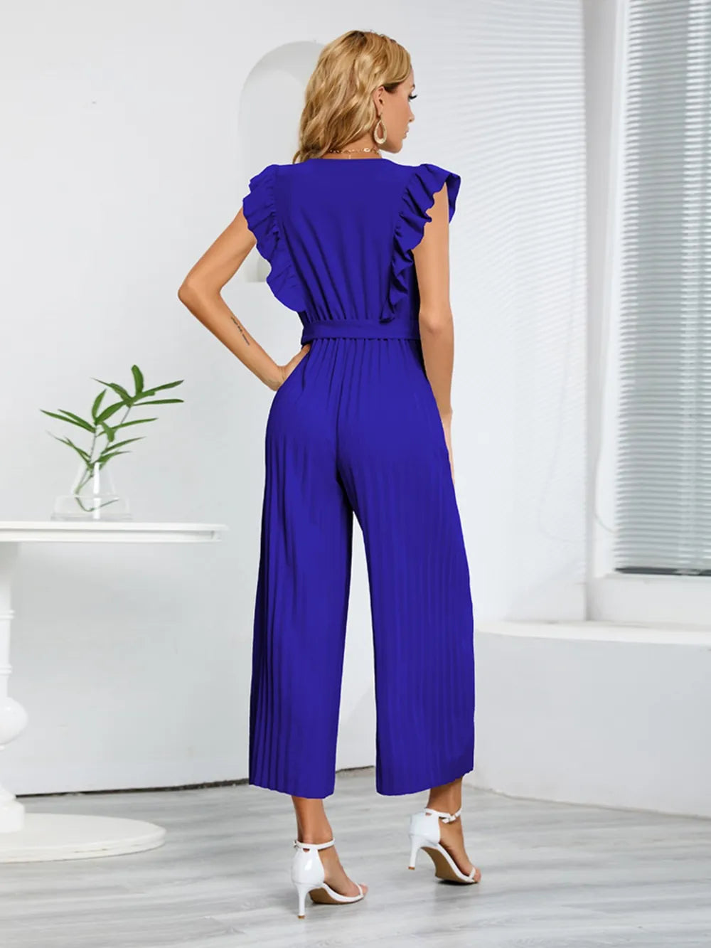 Geplooide jumpsuit met ceintuur en korte ruches mouwen