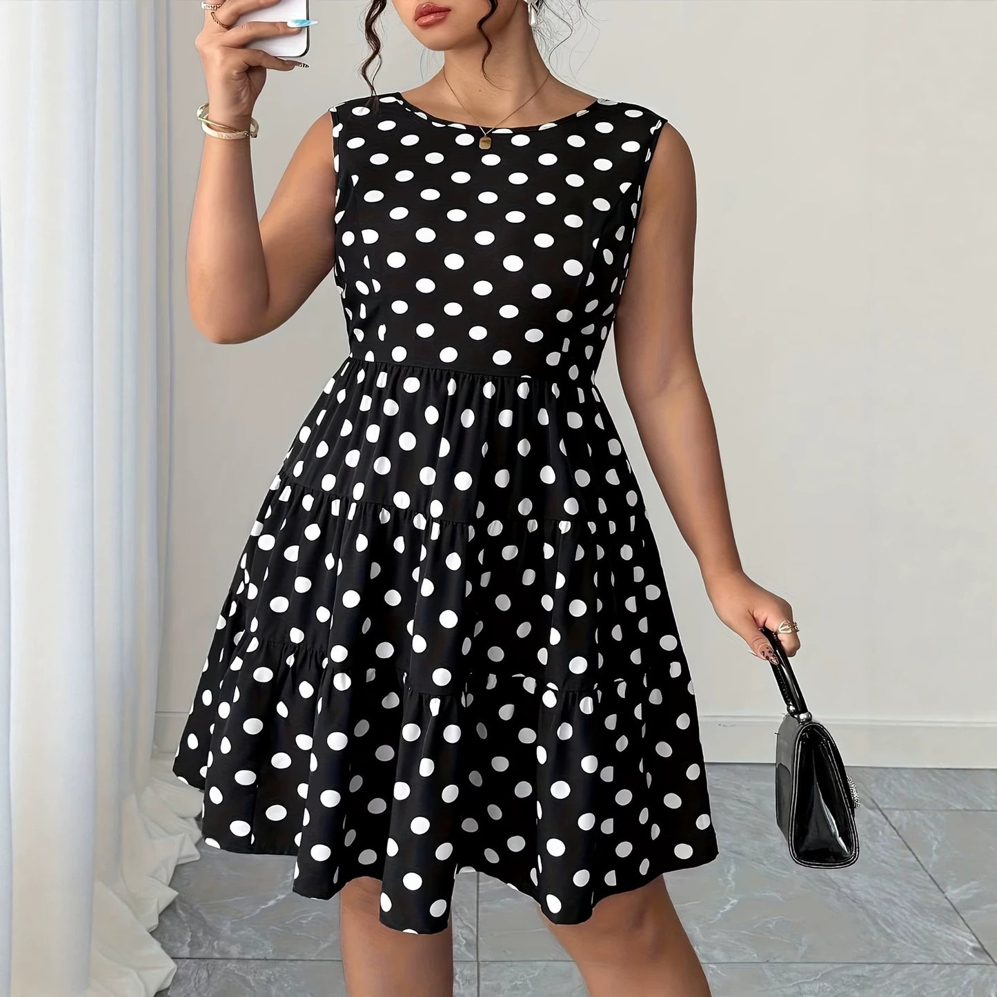 Plus size retro mouwloze jurkje  met parels stippenprint en strik