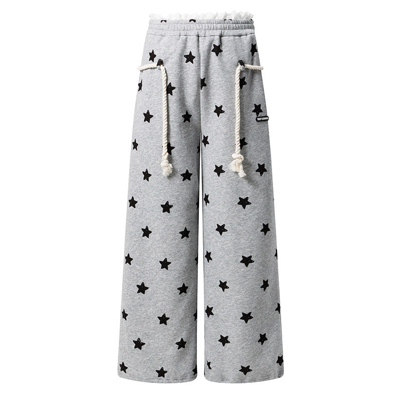 Dames joggingbroek met all-over sterren print wijde pijpen in een relaxte stijl