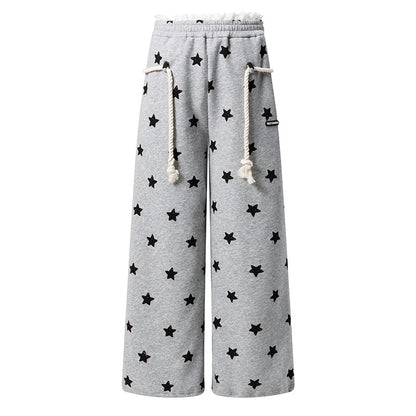 Dames joggingbroek met all-over sterren print wijde pijpen in een relaxte stijl