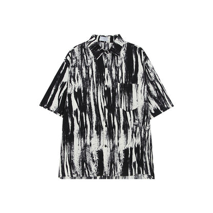 Stijlvolle oversized overhemd met korte mouwen en inktspatpatroon
