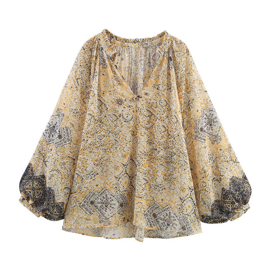 Elegant vormgegeven shirttop of midi-rok met print
