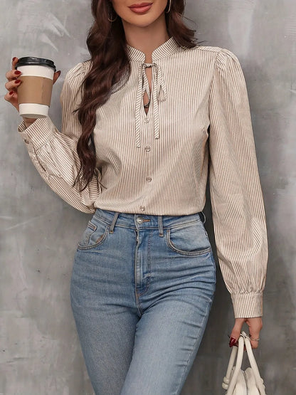 Blouse met lange mouwen en strepen en strik