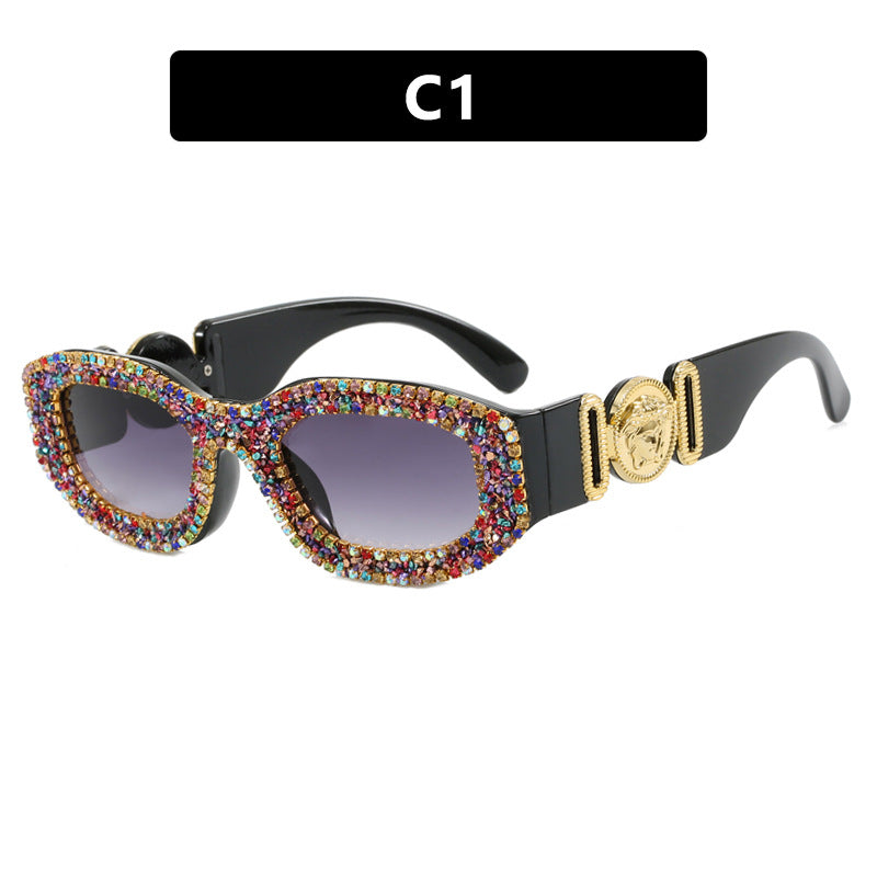 Luxe dameszonnebril met diamanten montuur