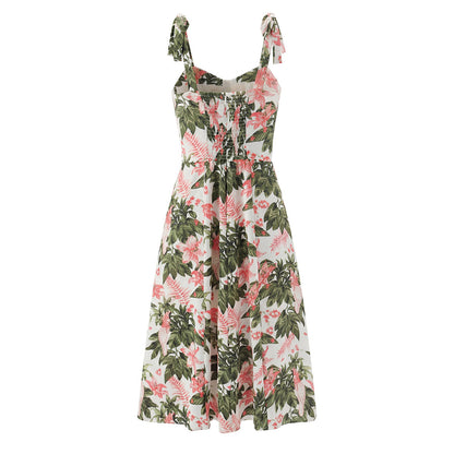 Getailleerde jurk met bloemenprint ceintuur en strikbandjes