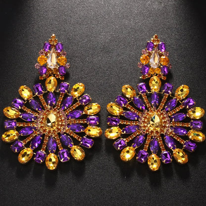 Holle kristallen oorbellen met opvallende hangers