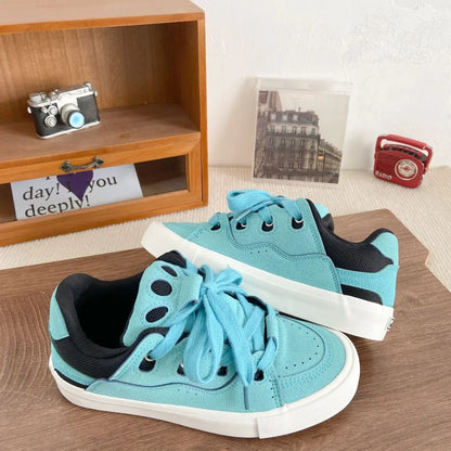 Contrasterende unisex sneakers met ronde neus