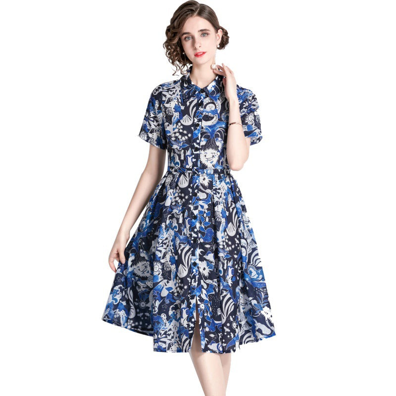 Blauwe blousejurk met bloemenprint omgeslagen kraag en korte mouwen