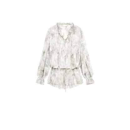 Modieuze lente/zomer blouse met bloemenprint ruches  V-hals en strikceintuur