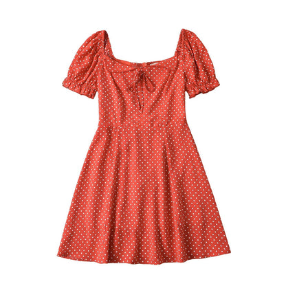 Mini-jurk met stippen en korte mouwen