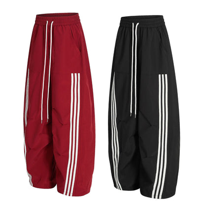 Sportpak met drie strepen voor heren jasje met opstaande kraag en broek met wijde pijpen