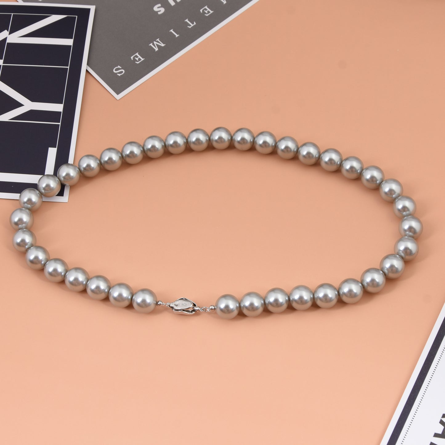 Film and Television same style 925 Yuanbao knot pearl necklace knotted clavicle chain French gray pearl chain offline store hot selling product