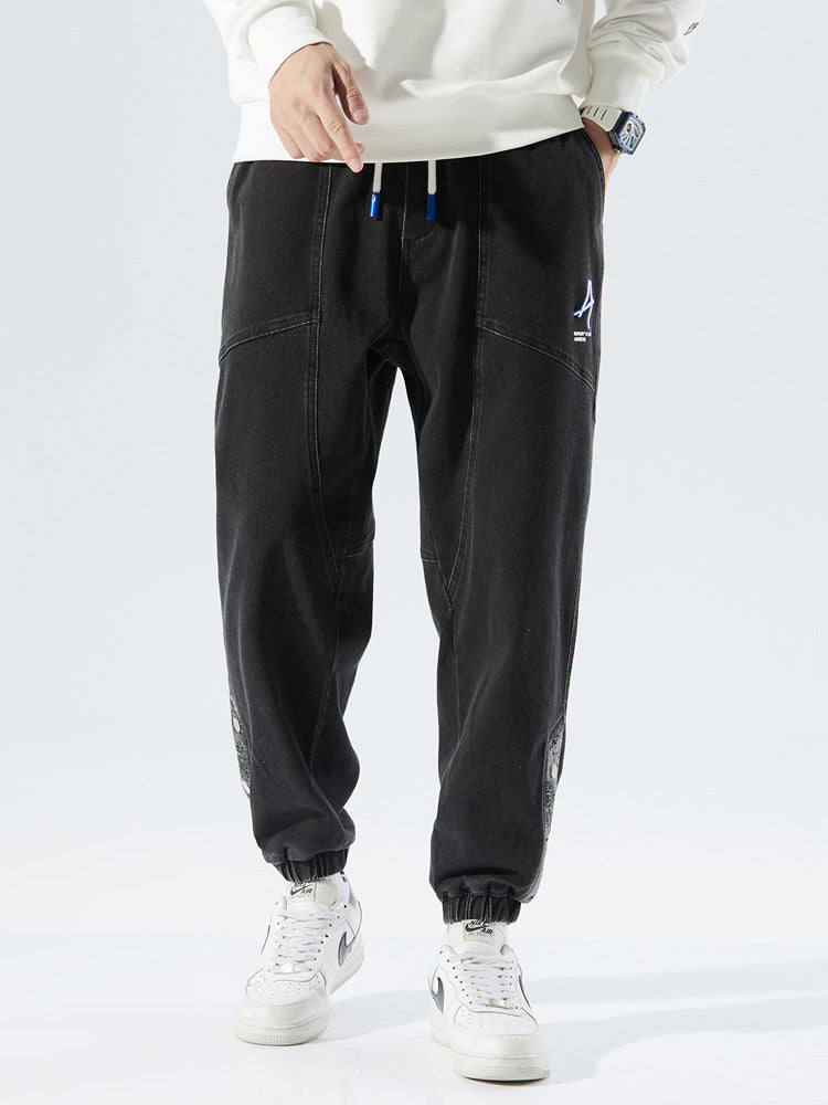 Heren losse jeans met modieuze borduursels