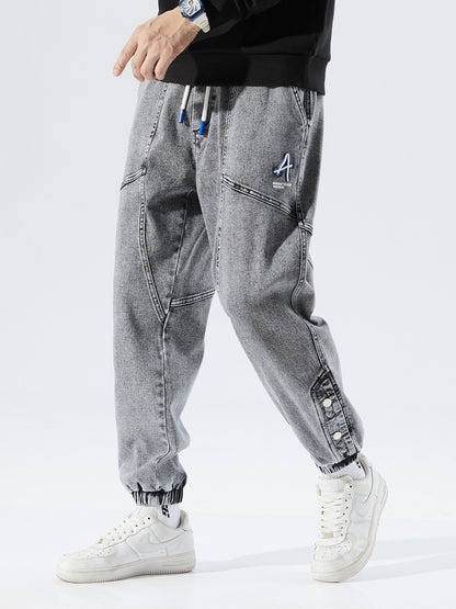 Heren losse jeans met modieuze borduursels