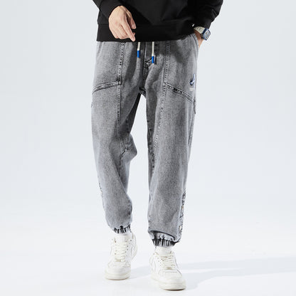 Heren losse jeans met modieuze borduursels
