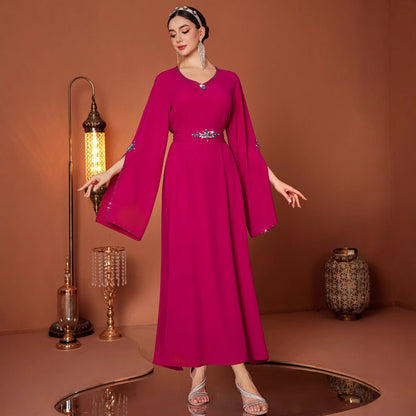 V-hals Turkse jurk met handgestikte diamantversieringen