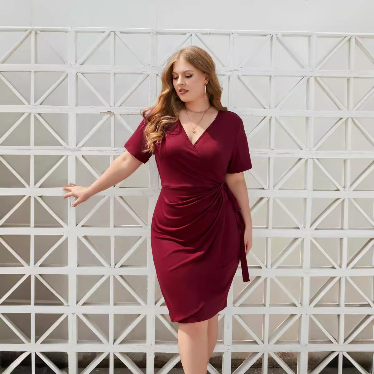 Cross-border plus size women's clothing plus size solid color casual holiday dress bandage vacation V-neck mid-length dress