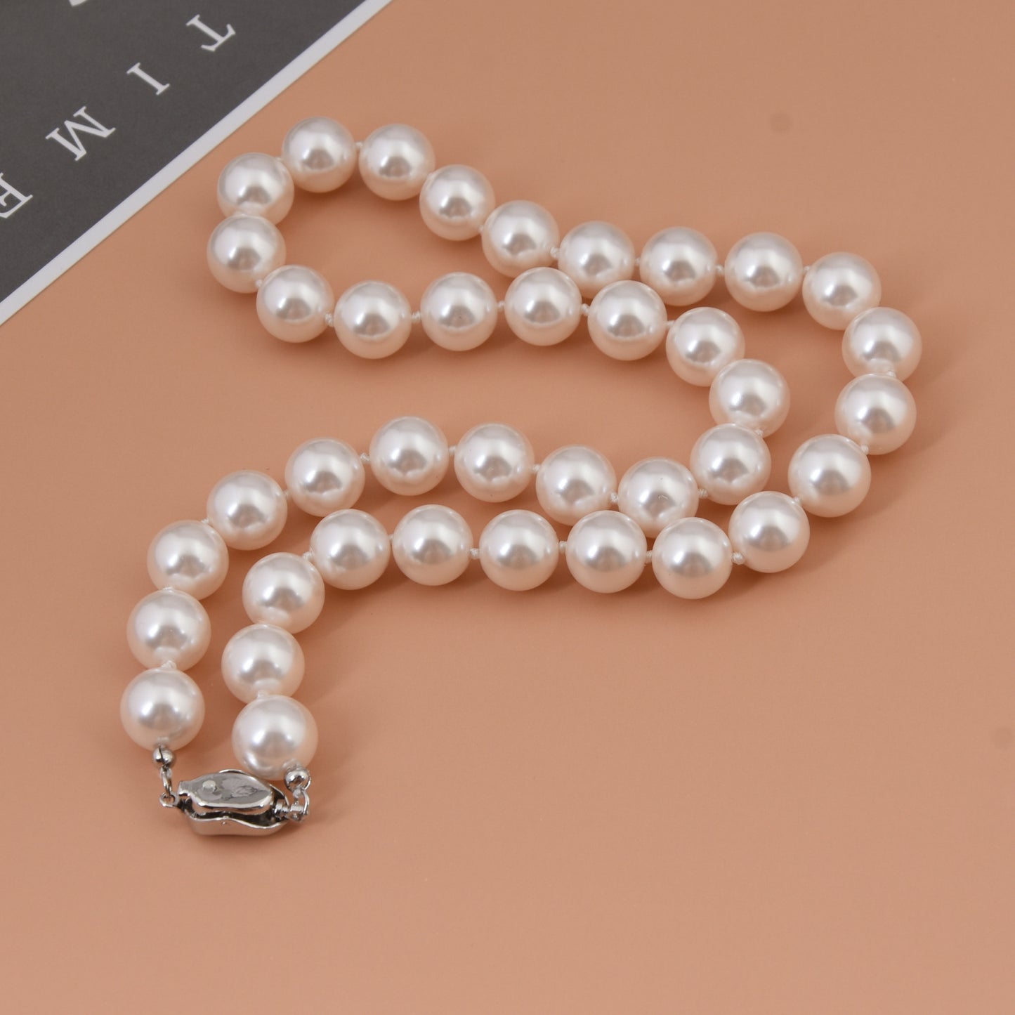 Film and Television same style 925 Yuanbao knot pearl necklace knotted clavicle chain French gray pearl chain offline store hot selling product