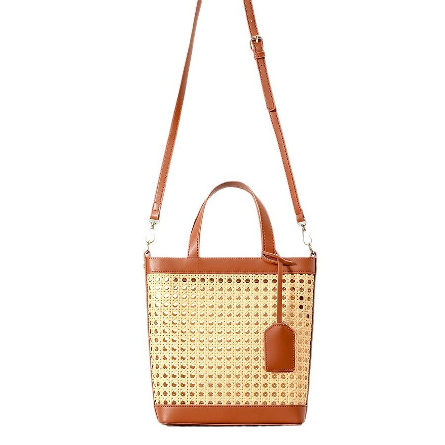 2025 spring/summer handmade Vine woven straw bag women's seaside holiday shoulder messenger bag hollow six-eye octagonal handbag