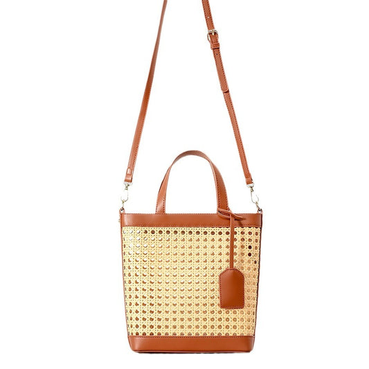 2025 spring/summer handmade Vine woven straw bag women's seaside holiday shoulder messenger bag hollow six-eye octagonal handbag