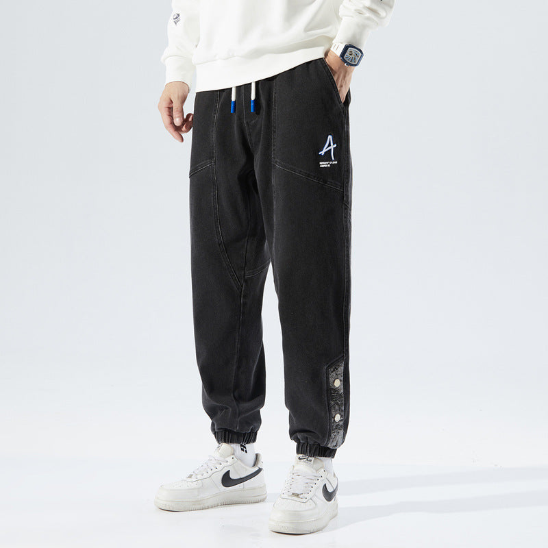 Heren losse jeans met modieuze borduursels