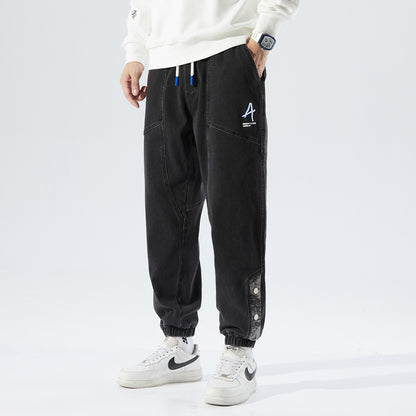 Heren losse jeans met modieuze borduursels
